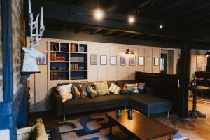 a living room with a couch and a table at Brigg White Hart - Total Pub Takeover in Brigg
