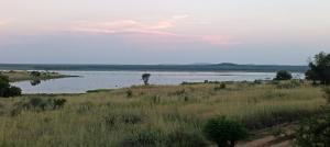 a view of a large body of water at Vaalkop Dam Reserve Log Cabin, Self-Catering, Beestekraal in Beestekraal