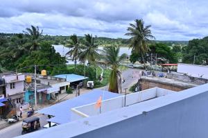 a view of a river from the roof of a building at RK Comforts in Belūr