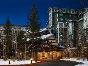 a hotel in the snow at night at Marriott Mountainside Luxury 1BD in Park City