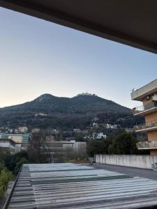 a view of a mountain from the roof of a building at B&B Sorgenti del Gari in Cassino