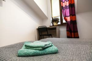 Posteľ alebo postele v izbe v ubytovaní Minihotel Freedom
