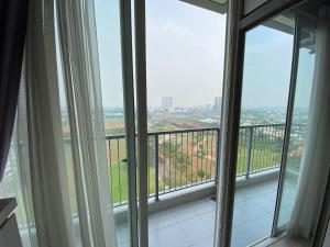 a room with a large window with a view at Casa De Parco Apartment Max 4 Guests in Samporo
