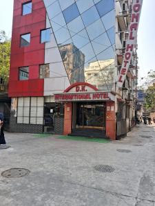 a building with a sign for a hotel at D. K. INTERNATIONAL HOTEL PVT. LTD in Calcutta Bara Bazar