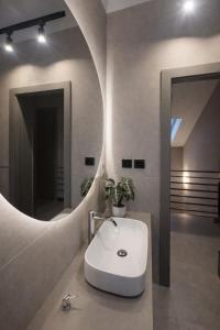 a bathroom with a sink and a mirror at Oaza Radęcin in Woldenberg Neumark +41 photos