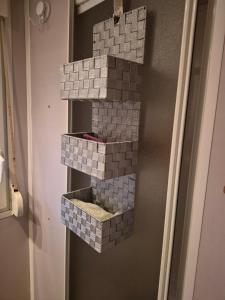 a shelf made out of lego bricks on a door at Casa da praia fluvial o Moinho in Benquerença