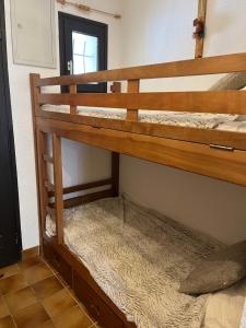 a couple of bunk beds in a room at Appartement Saint chaffrey in Saint-Chaffrey