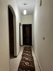 a hallway with a hallwayngthngthngthngthngthngthngthngthngthngthngth at Luxor flats and apartments in Luxor