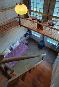 an overhead view of a room with two bunk beds at Kima IV in Huerta Grande