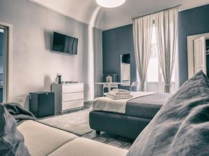 TV a/nebo společenská místnost v ubytování Ajde rooms & breakfast
