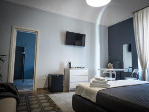 TV a/nebo společenská místnost v ubytování Ajde rooms & breakfast