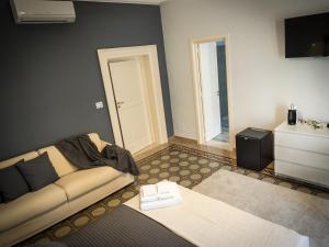 Postel nebo postele na pokoji v ubytování Ajde rooms & breakfast