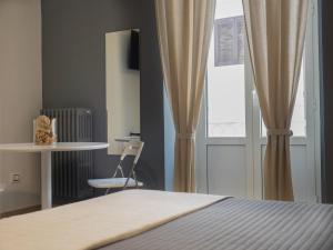Postel nebo postele na pokoji v ubytování Ajde rooms & breakfast