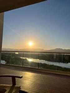 a view of the sunset from the deck of a ship at Gran Luxxe 2 bdrm suite in Nuevo Nayarit