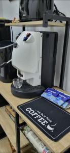 a sewing machine sitting on top of a table at Renova7io sweet home Napoli in Naples