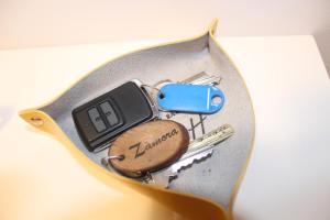 a knife with a football and a cell phone on it at LA OKIYA DE TATI in Zamora
