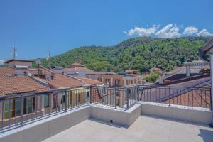 a view from the balcony of a building with a mountain at Casa Frutta in Petrich