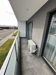 a heater is sitting on the side of a building at Sara Home in Baia Mare +8 photos