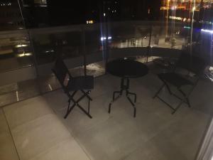 a table and chairs sitting on top of a building at Nocleg Zagnańska in Kielce