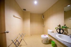 a bathroom with a toilet and a sink at Z-Talay House in Klong Muang Beach +33 photos