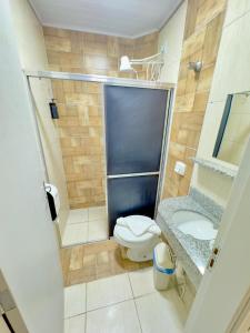 a small bathroom with a toilet and a sink at Pousada de Bonito in Bonito +38 photos