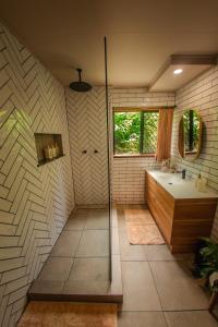 Vonios kambarys apgyvendinimo įstaigoje Tranquil Rainforest Studio Kuranda dar 41 nuotrauka
