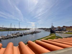 a view of a marina with boats in the water at Naval Guest House in Vila do Conde
