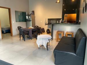 a living room with a couch and a table at BYS Alojamiento in Ciudad del Este