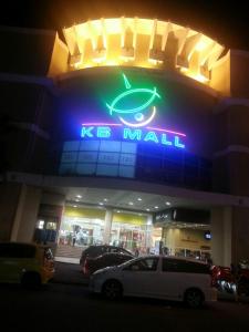 a kle mall sign in front of a car dealership at Homestay KBCC in Kota Bharu