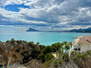 a house on a hill with a view of the ocean at ALTEA LUXURY - Blue Pearl in Altea la Vieja