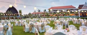 an image of a wedding reception with white tables and chairs at MERUSAKA Nusa Dua in Nusa Dua +160 photos