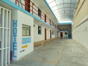 an empty hallway in a school building with a ceiling at Bugambilia Campeche in Campeche