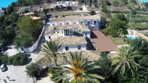 an aerial view of a house with a swimming pool at Hotel Tossal d'Altea in Altea