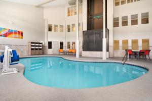 a large swimming pool in the middle of a building at The Kendrick Hotel, an Ascend Collection Hotel in Flagstaff
