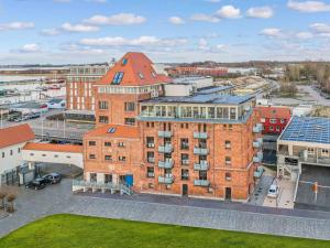an aerial view of a large brick building at Lütt Haven in Barth