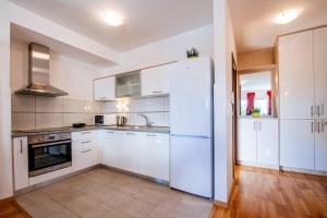 Kuchnia lub aneks kuchenny w obiekcie Rainbow apartments