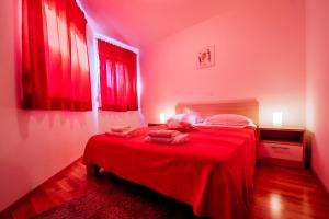 Łóżko lub łóżka w pokoju w obiekcie Rainbow apartments