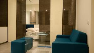 Posezení v ubytování Mirror Apartments + 30 fotografií
