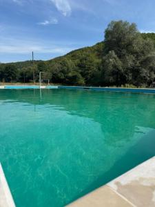 a pool of blue water with a goal at Rafting Kamp Dvije Vrbe in Foča