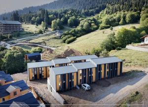 an aerial view of a building on a hill at Bakuriani in Bakuriani