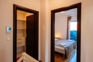 Łóżko lub łóżka w pokoju w obiekcie Rainbow apartments