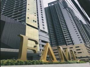 a large amazon sign in front of two tall buildings at AHN Haven in Sampong