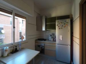 Una cocina o zona de cocina en Easy Stay Rome