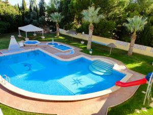 an image of a swimming pool in a yard at Bertur San Antonio Mar in Alcossebre