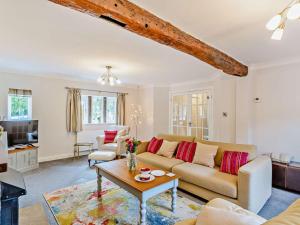 a living room with a couch and a table at 3 Bed in Harrogate oc-93305 in Summer Bridge