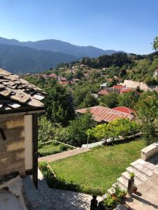 a view of a town from a house at ΤΟ ΑΡΧΟΝΤΙΚΟ in Kríkellon