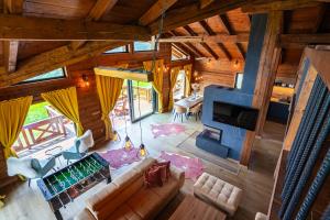 an overhead view of a living room in a log cabin at Chalet George in Zázrivá