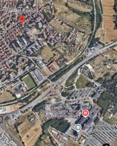 a map of a city with a red dot at Casa del Coro in Perugia