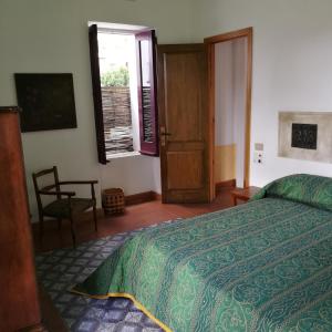 Postel nebo postele na pokoji v ubytování La Locanda del Barbablù