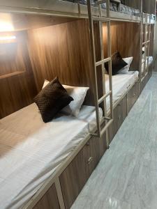 two bunk beds on a boat with at Shiv ghar Stay in Varanasi